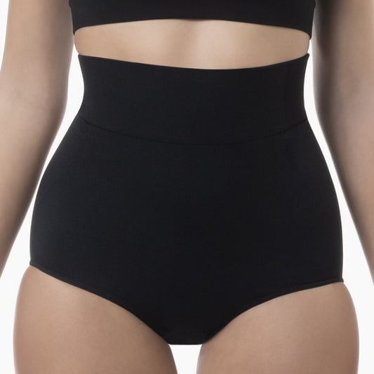 Front view of women’s black high-waisted shapewear brief worn by model