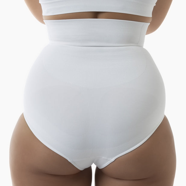 Back view of women’s white high-waisted shapewear brief worn by model