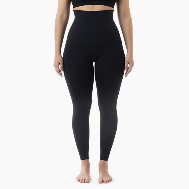 ront view of women’s black high-waisted tummy control leggings worn by model – product 609y