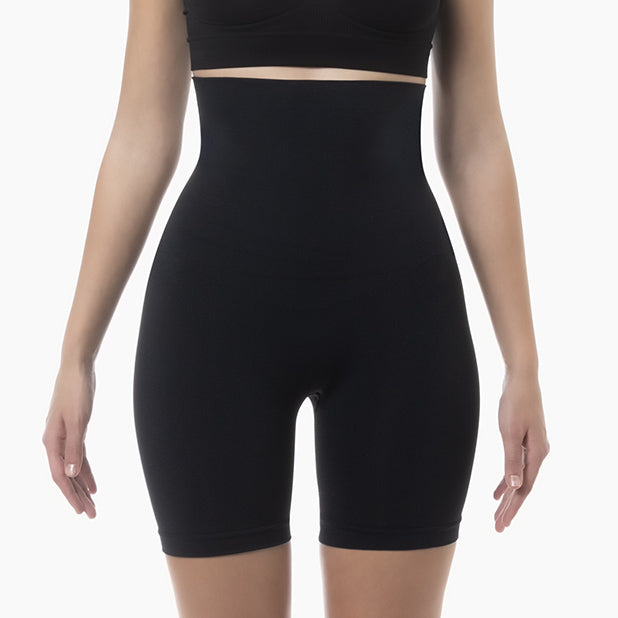 Front view of women’s black seamless shaping high waist shorts worn by model – product 603y