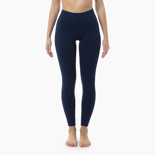 Front view of women’s blue anti-cellulite compression leggings worn by model – product 1109