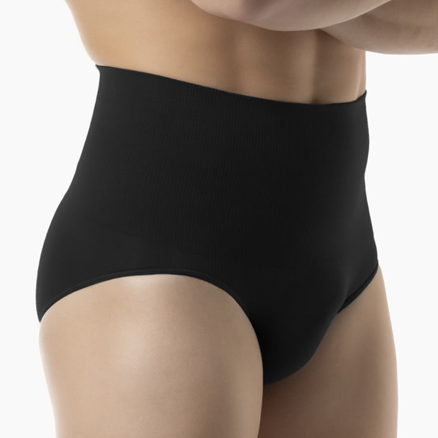 Right side view of men’s black tummy control shapewear brief worn by model
