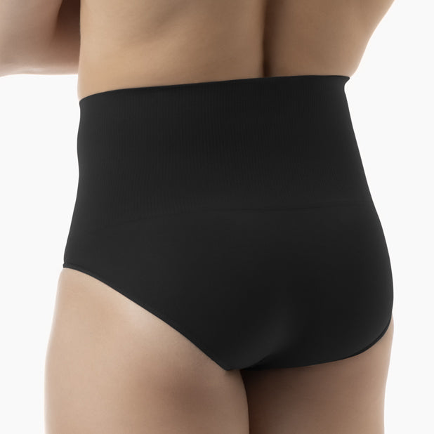 Back view of men’s black tummy control shapewear brief worn by model