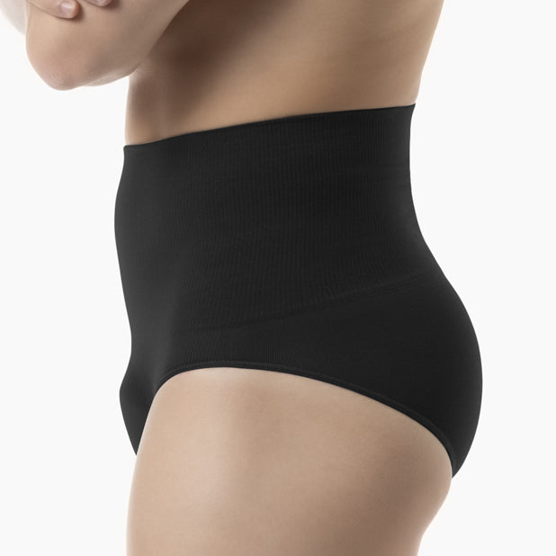 Left side view of men’s black tummy control shapewear brief worn by model