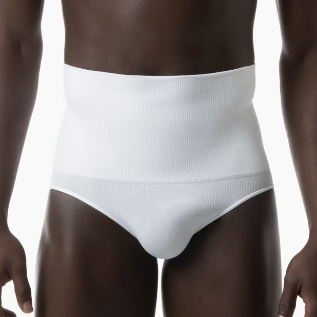 Front view of men’s white tummy control shapewear brief worn by model