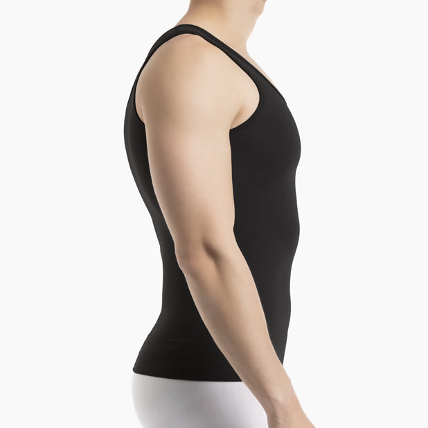 Right side view of men’s black gynecomastia compression tank top worn by model – product 418