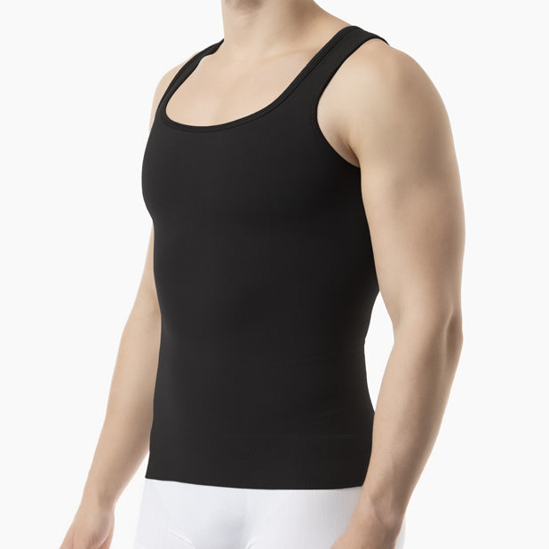 Left side view of men’s black gynecomastia compression tank top worn by model – product 418