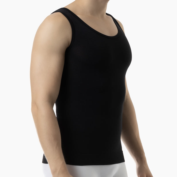 Right side view of men’s black slimming compression tank top worn by model – product 417b