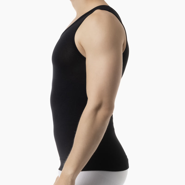 Left side view of men’s black slimming compression tank top worn by model – product 417b