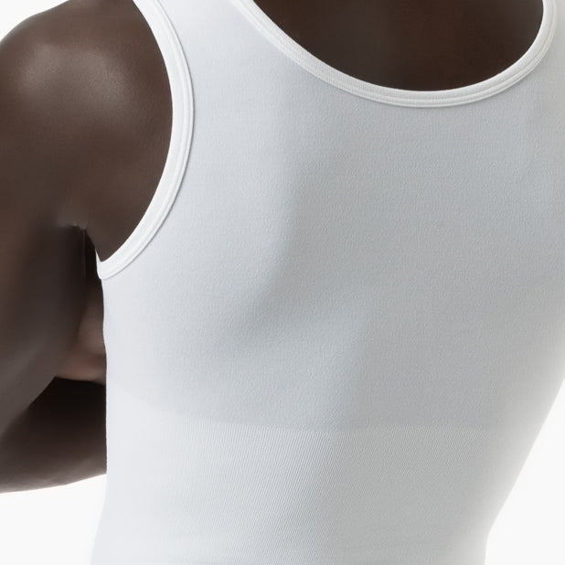 Back detail of men’s white slimming compression tank top worn by model – product 417b