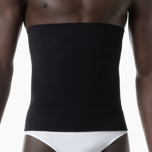 Front view of men’s black shapewear waist cincher worn by model