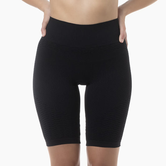 Front view of women’s black anti-cellulite compression shorts worn by model – product 1103