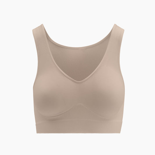 Front view of powder shapewear bra with wide shoulder straps on mannequin